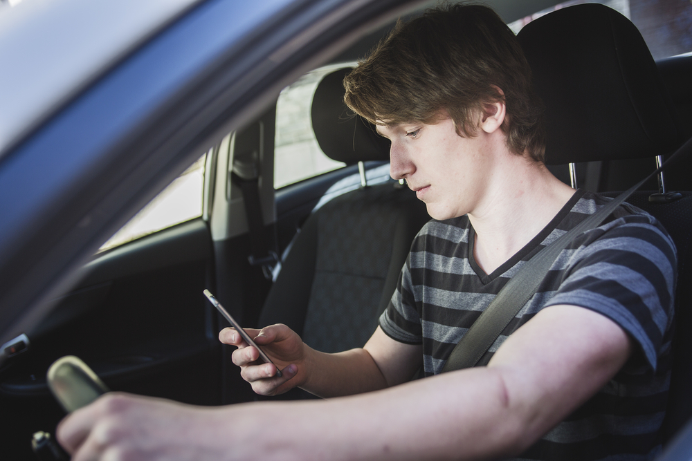 How many teens text and drive